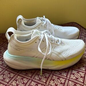 ASICS Women’s Gel-Nimbus white sneakers.